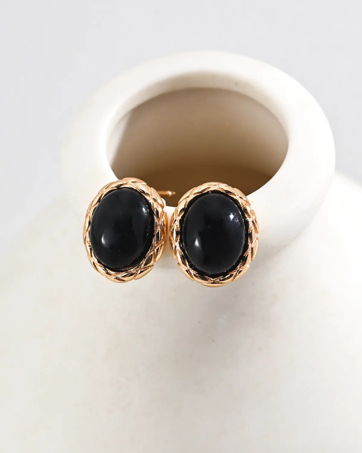 Guardian’s Gaze black agate stud earrings in gold setting