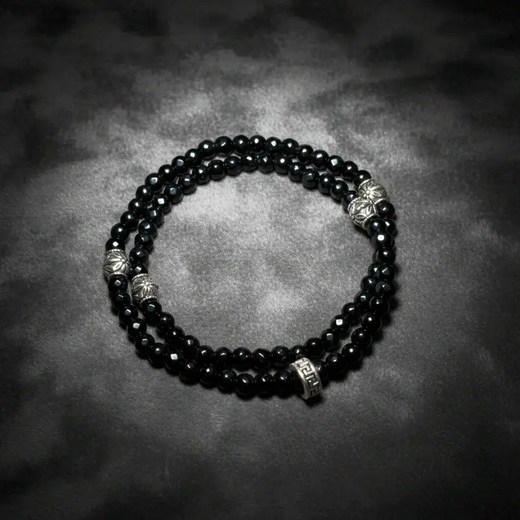 Black agate double wrap bracelet handmade with faceted gemstone beads, designed by Oculux Jewelry.