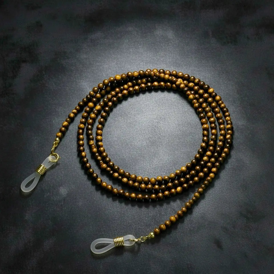 Tiger eye eyeglass chain 3mm version displayed on neutral background, featuring polished golden-brown gemstone beads handcrafted by Oculux Jewelry.